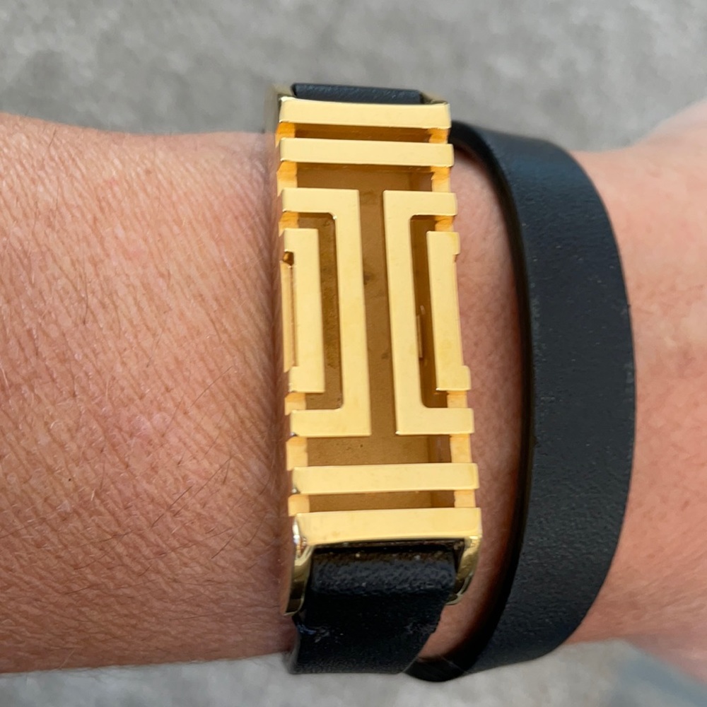 Tory Burch wrap around Fitbit cover. Leather